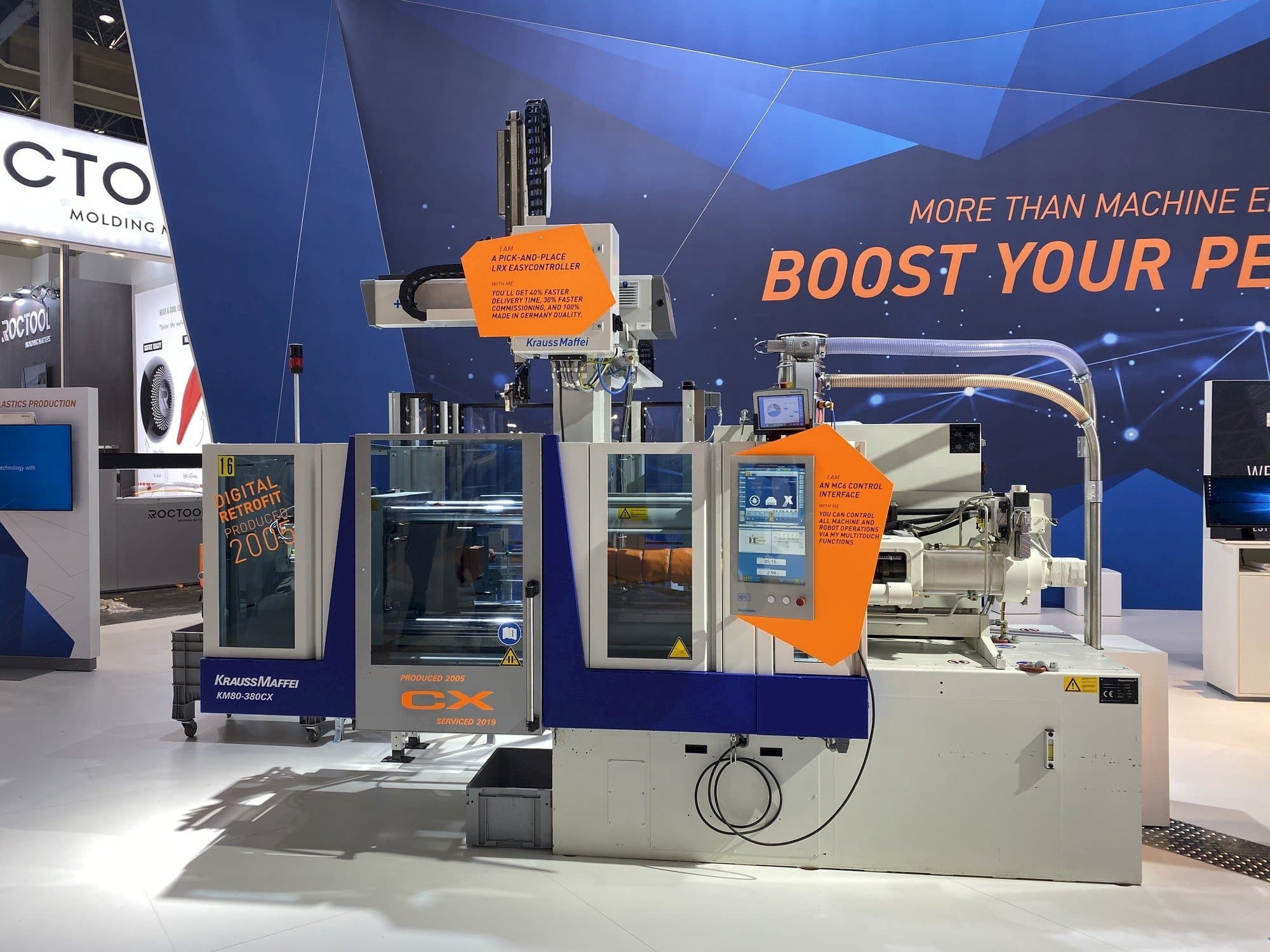 Vista frontal de la máquina Krauss Maffei 80-380 CX + LRX easyControl 100