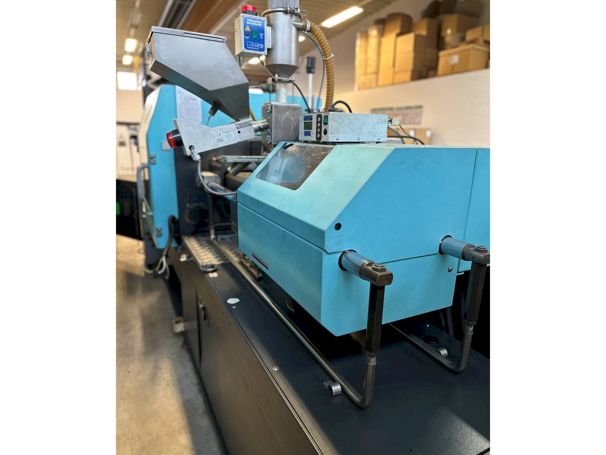 Vista frontal de la máquina DEMAG Concept 80/370-120