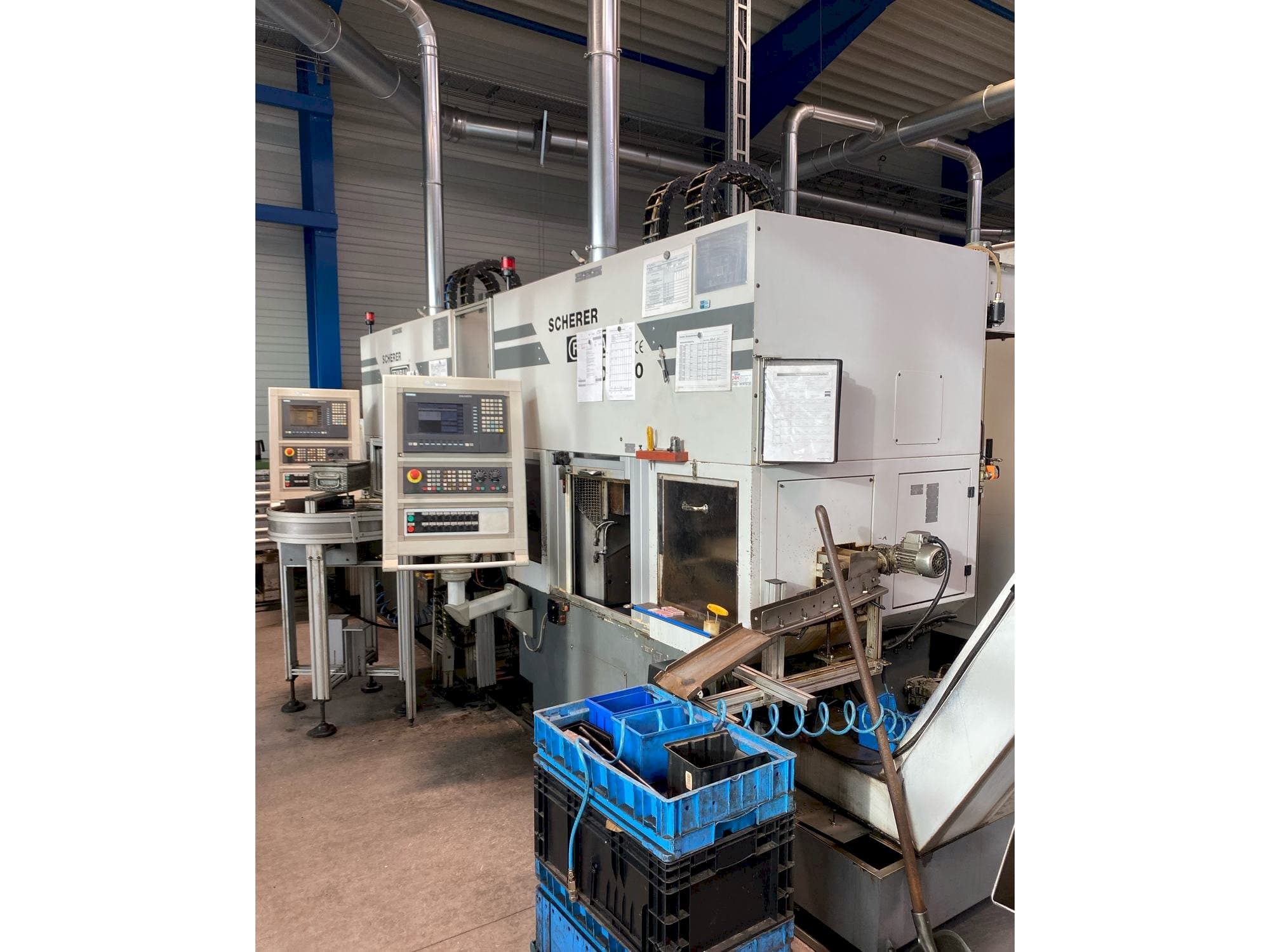 Vista frontal de la máquina Scherer - Feinbau VDZ 100