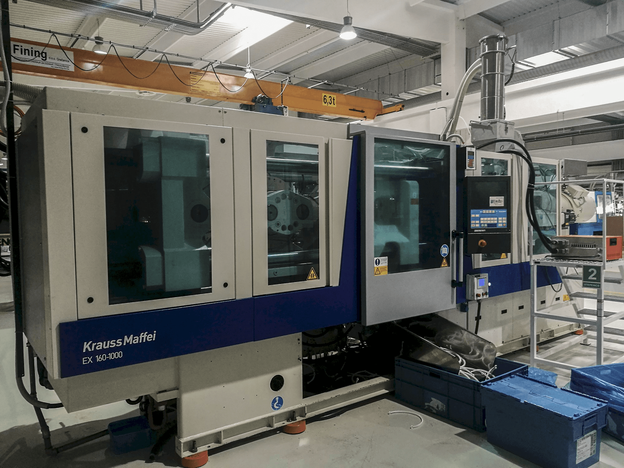 Vista izquierda de la máquina Krauss Maffei 160-1000 EX