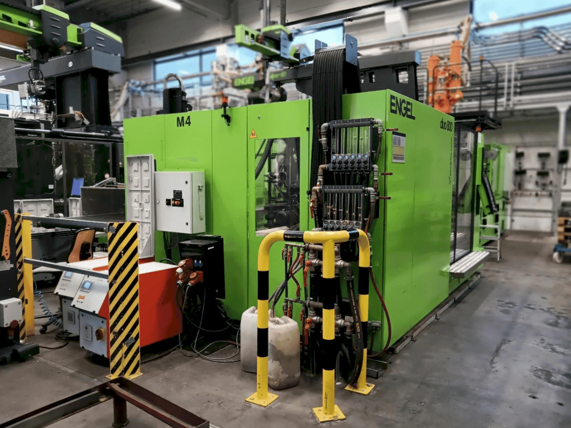 Left view of Engel Duo 11050/800 machine