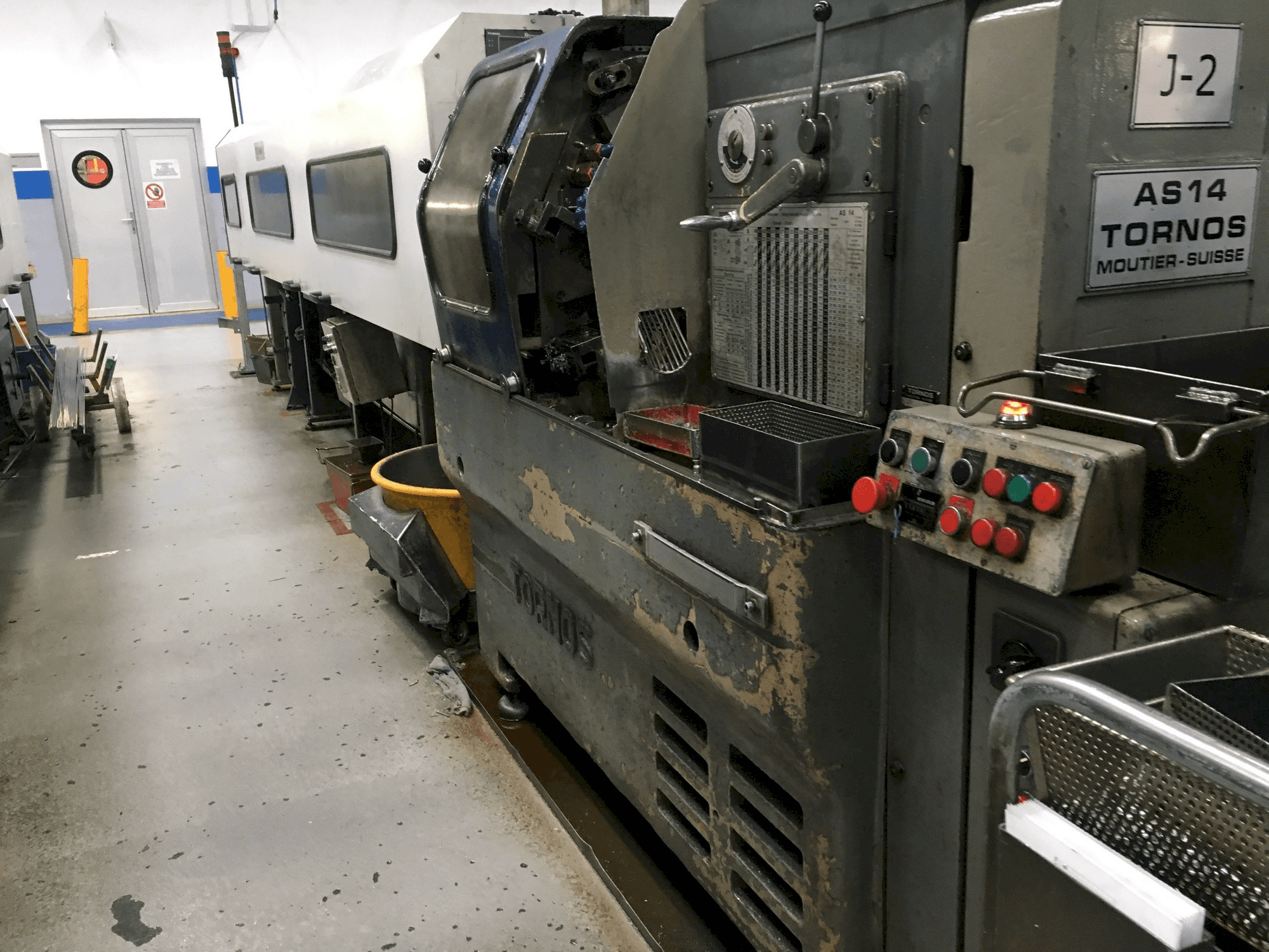 Front view of Tornos-Moutier Suisse AS 14 machine