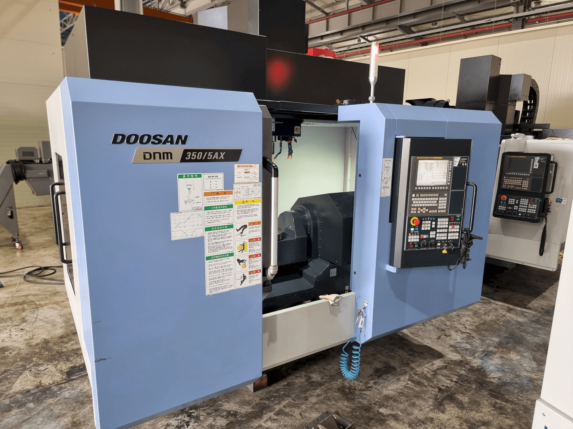 Front view of Doosan DNM350/5AX machine
