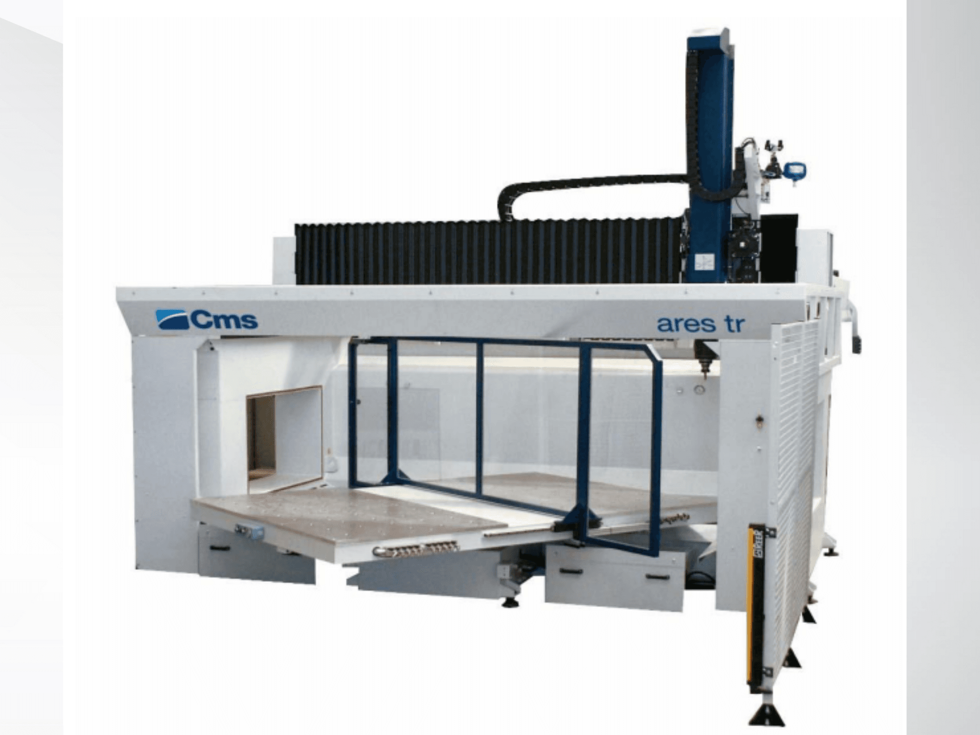 La máquina CNC CMS Ares TR, vista lateral, presenta una mesa de trabajo grande y un diseño cerrado para aplicaciones de corte de precisión.