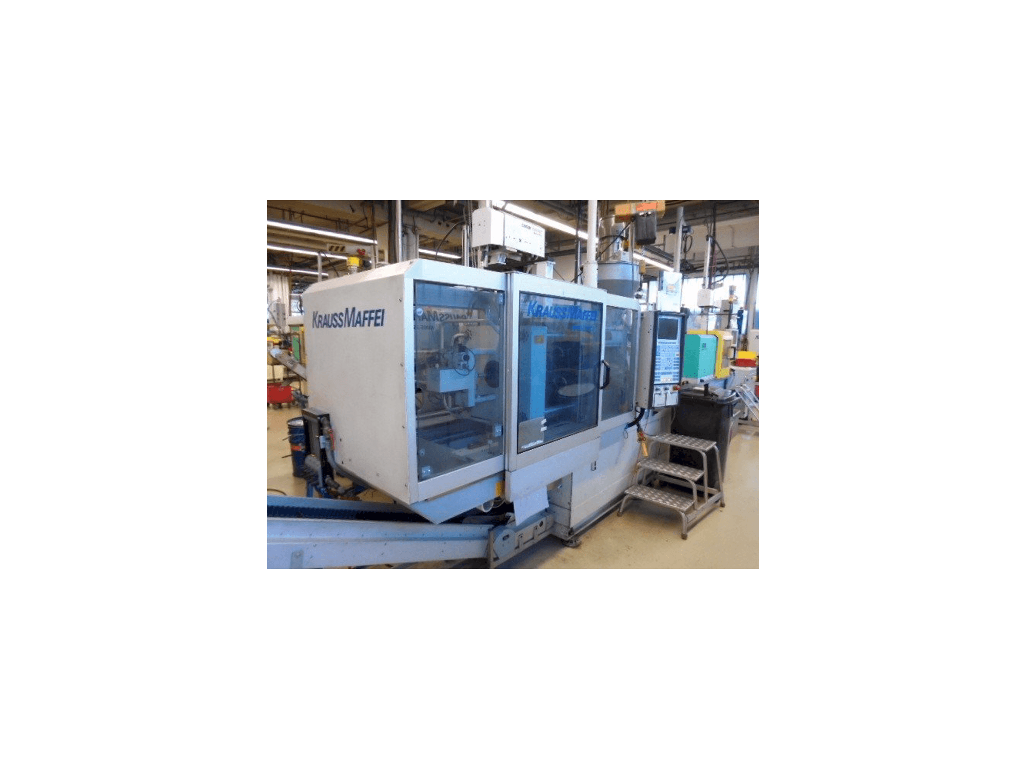 Left side view of Krauss Maffei KM 65-390-C2 machine