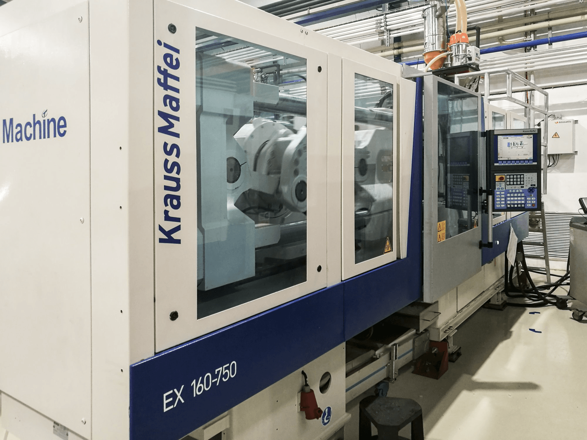 Vista izquierda de la máquina Krauss Maffei 160-750 EX