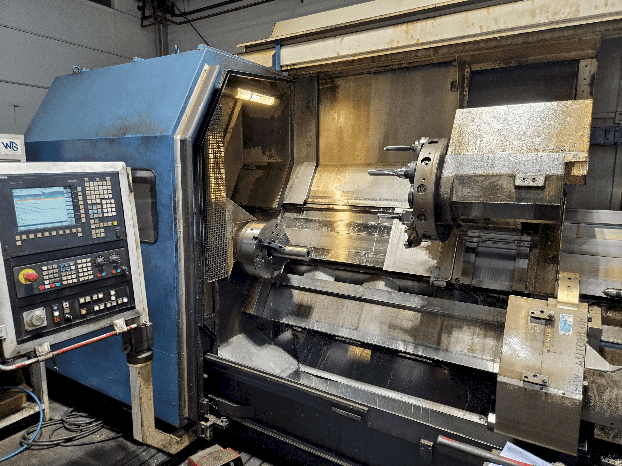 Vista frontal de la máquina HEYNUMAT 21 U/2500