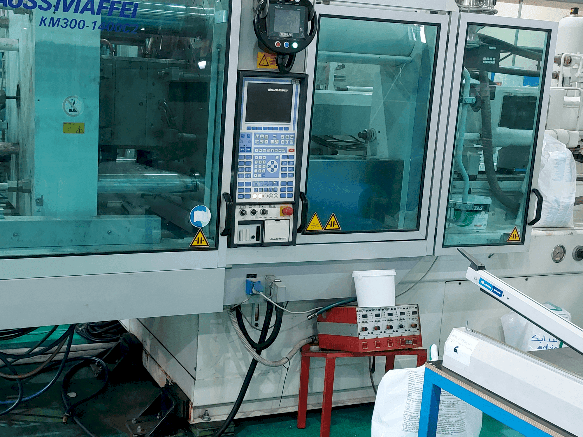 Front view of Krauss Maffei 300 – 1400 C2 machine