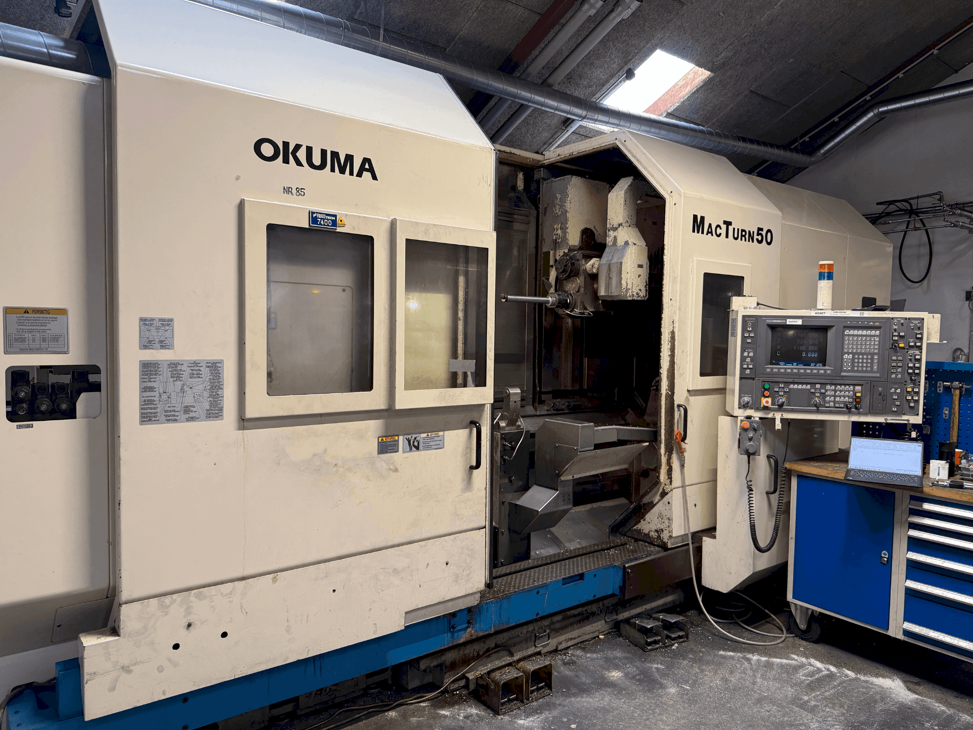 Front view of Okuma MacTurn 50 machine