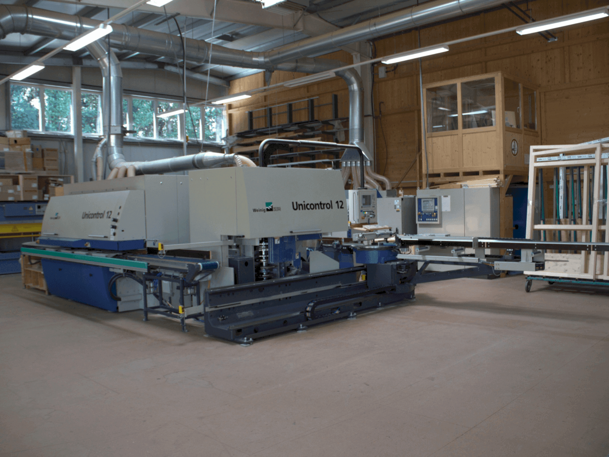 Vista frontal de la máquina WEINIG / DIMTER UNICONTROL 12